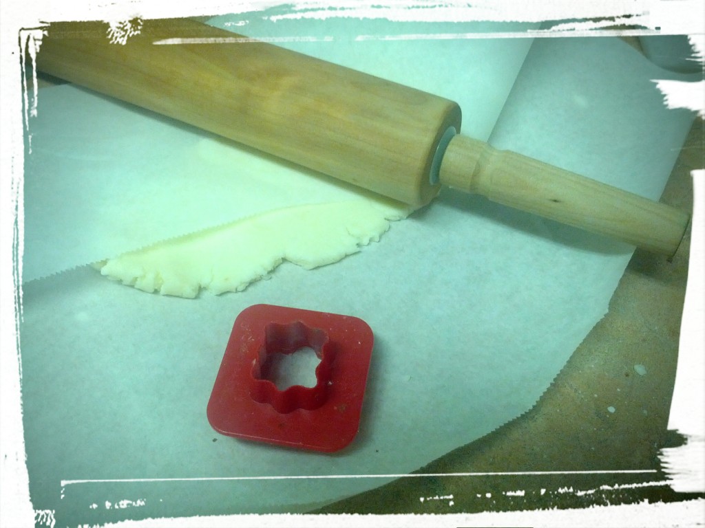 Rolling out the filling between two pieces of parchment paper. So fragrantly yummy! 