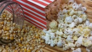 White cheddar popcorn in a paper bag